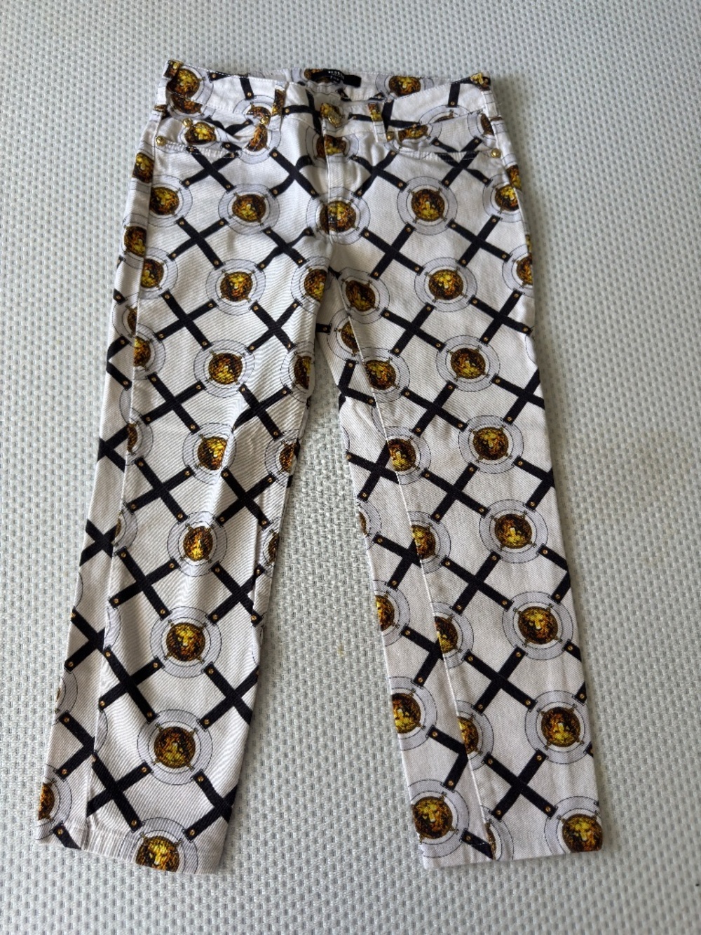 Versace White Pants with Black Lattice and Gold Medallion Print